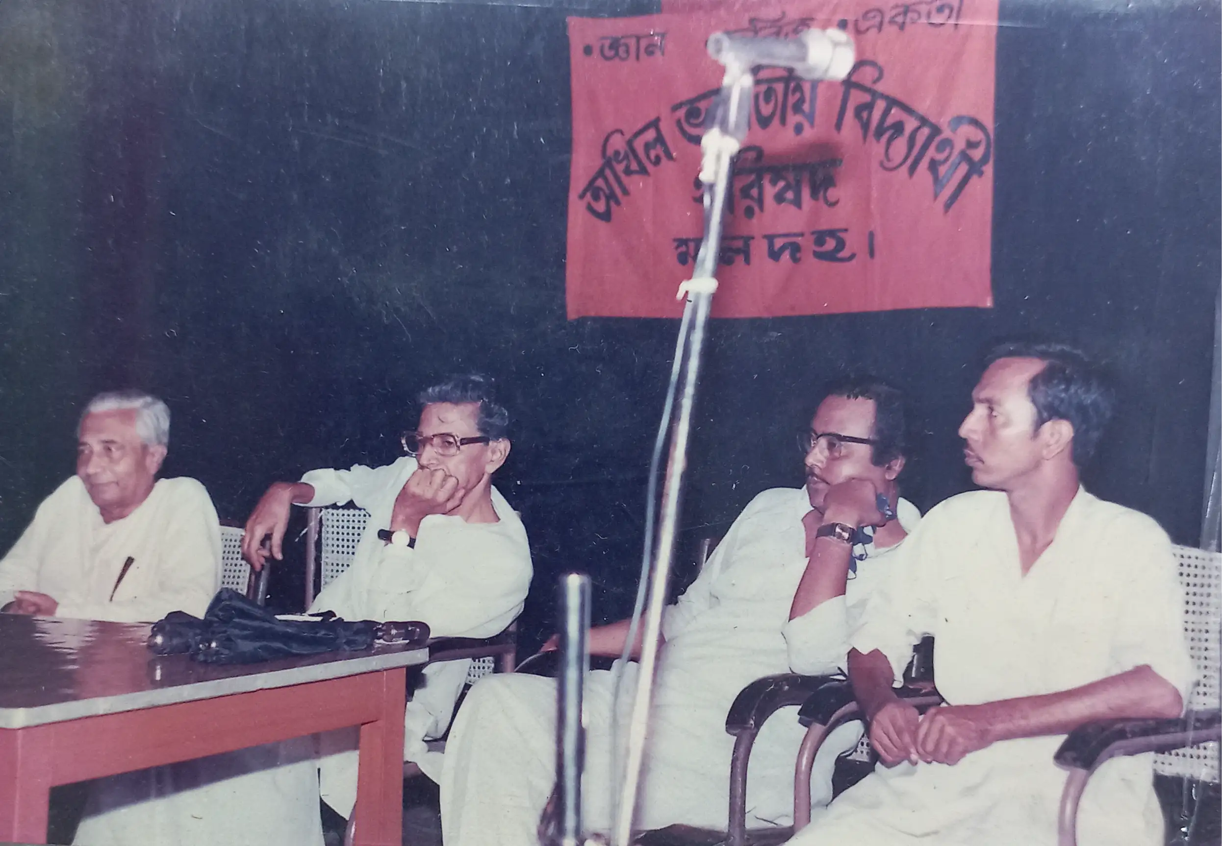 This is an image of Dr. Gopesh sitting on the stage of the Akhil Bharatiya Vidyarthi Parishad (ABVP) organisation affiliated to Rashtriya Swayamsevak Sangh (RSS).
